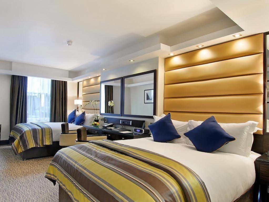 เดอะ มาร์เบิล อาร์ช ลอนดอน Hotel ภายนอก รูปภาพ A bedroom at the Hilton London Paddington